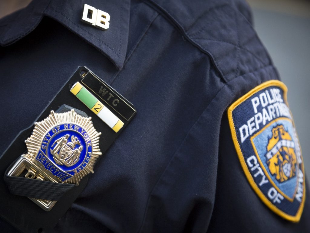 NYPD officer badge close up