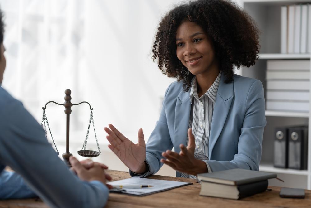 Lawyer meets with client to explain who qualifies for the I-601A waiver.